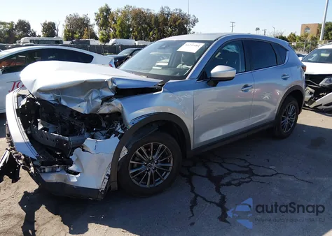 2020 Mazda Cx-5 Touring z USA, uszkodzony, nr VIN JM3KFACM0L0807304